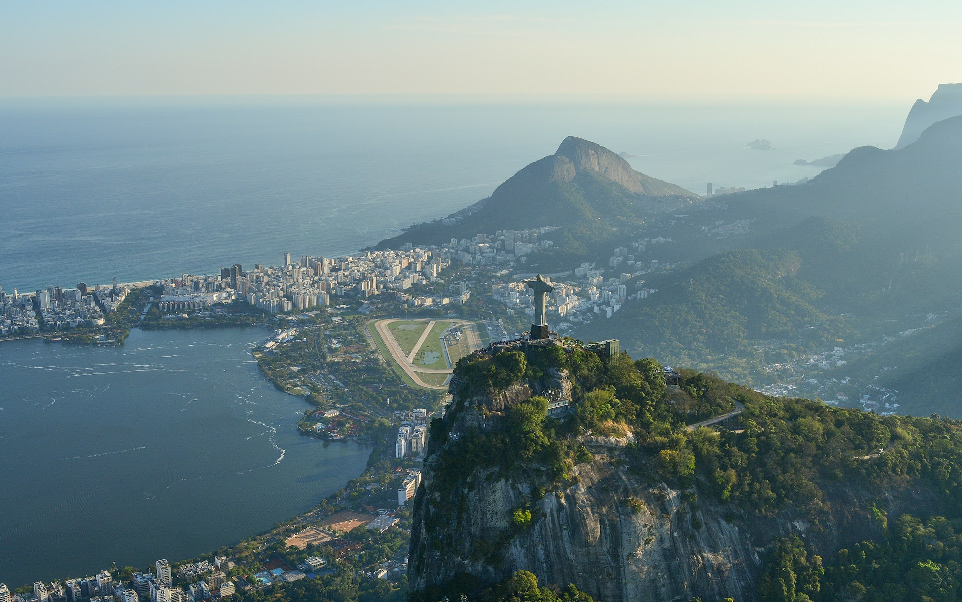 Aerial view of Rio de Janeiro with Christ the Redeemer statue overlooking the city. | Photo by Raphael Nogueira on Unsplash